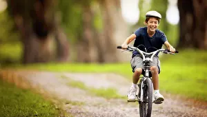 Bicycle Prints: Boy riding his bike on a footpath