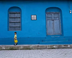 4 5 Years Prints: Boy standing on the sidewalk, Guatemala