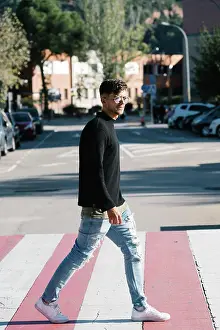 Disability Prints: boy with sunglasses crossing a zebra crossing