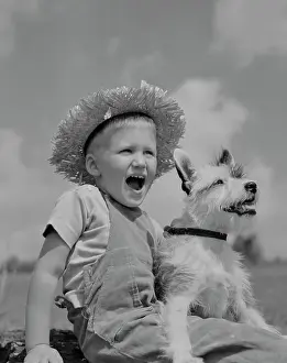 Overalls Prints: Boy with terrier dog