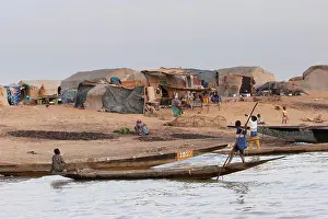 Nautical Prints: Boys on a boat near a village on the Niger River between Lake Debo and Sebi, Mali