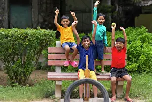 Positive Emotion Prints: Boys celebrating victory after winning cricket match