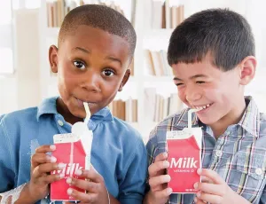 Refreshing Prints: Boys drinking milk from carton