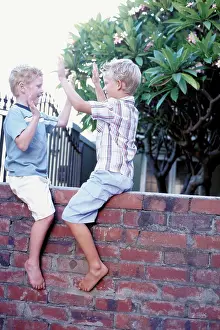 Chum Prints: Boys playing on wall
