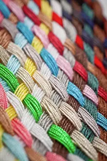 Handwork Prints: Braid of colourful threads A braid of colourful sewing threads