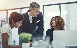 Financial Prints: Brainstorming, talking or business people in meeting with mentor for teamwork