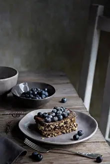 Dessert Prints: Breakfast with cereal bread and blueberries on wooden table