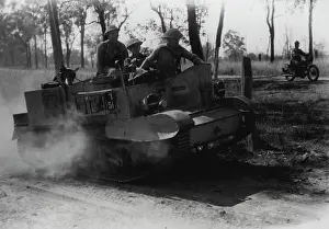 Guns Prints: Bren gun carrier in action during A