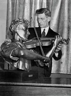 1946 Prints: Bricklayer - Cum - Sculptor, makes bust for Yehudi Menuhin with fin still as guide