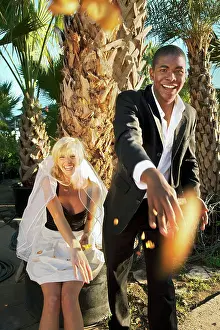 Apparel Prints: Bride and groom throwing flower petals