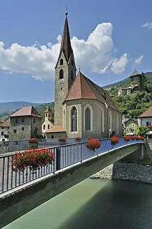 Mountain Chain Prints: Bridge over the river Eisack, Isarco and church at Chiusa