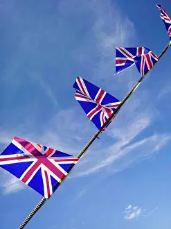 Somerset Prints: British Union Jack flags against a blue sky