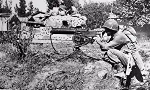 World War Two Prints: Browning Model A1 Machine Gun belonging to the American Army in the firing position