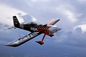 Acrobatic Prints: Bruce Bohannon flying his Exxon Flyin Tiger