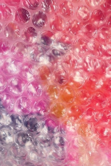 Plastic Prints: Bubble wrap over multicolor background