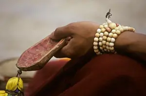 Buddhist monks hand with mala at the Monlam Chenmo Dances, Katok Monastery - Kham, (Tibet), Sichuan, China
