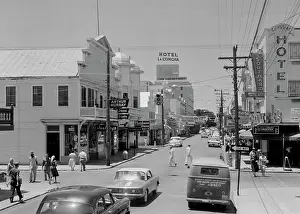 Pole Prints: Buildings along a road, Duval Street, Key West, Florida, USA