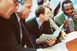 Businesswomen Prints: Business executives in a meeting