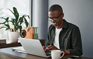 Black Man Prints: Business, laptop and happy black man typing in office for software