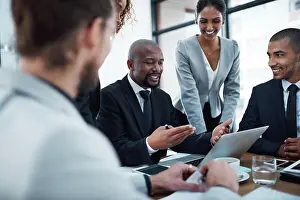 Meet Prints: Business, meeting and men and women with laptop in office for planning