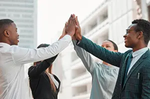 Partnership Prints: Business, people and happy with high five for support with teamwork