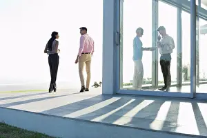 Conversation Prints: Business people talking outside office