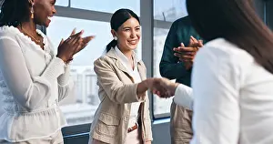 Business people, team and handshake with applause for partnership