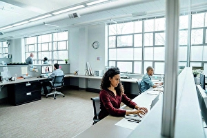 Associate Prints: Business people working in busy office