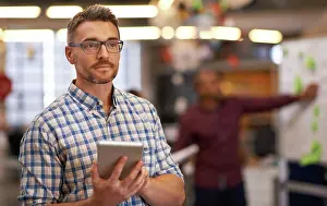 Brainstorming Prints: Business, thinking and man with tablet in office