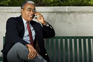 Communications Prints: Businessman on cellular headset