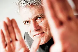 50 54 Years Prints: Businessman gesticulating defensively
