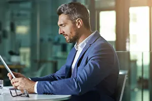 Networking Prints: Businessman, investing or accountant with tablet for finance news and budget planning in office