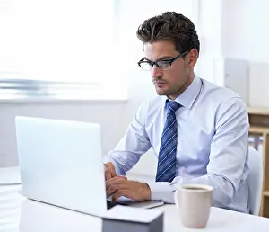 Keyboard Prints: Businessman, laptop and typing in office for online communication as financial consultant