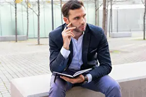 Stadt Prints: Businessman, looking away, thoughtful