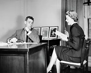 Business Suit Prints: Businessman looking at the legs of his secretary sitting beside him
