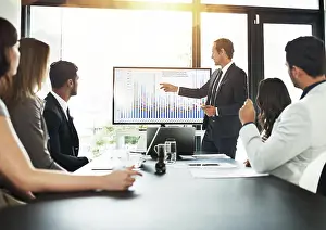 Paperwork Prints: Businessman, meeting and presentation with data on screen for hr metrics review