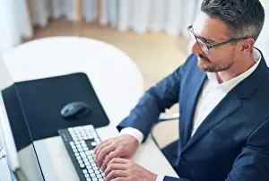 Problem Solving Prints: Businessman, smile and working on computer