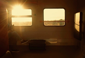 Wagon Prints: businessman traveling by train. passenger man in casual clothes