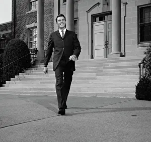 Courthouse Prints: Businessman walking from courthouse
