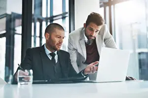 Problem Solving Prints: Businessmen, laptop and question for discussion in office