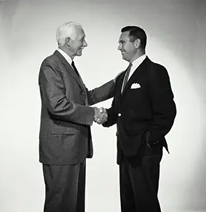 Partnership Prints: Two businessmen shaking hands