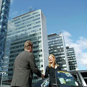 Business Women Prints: Businesswoman and businessman shaking hands