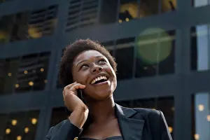 Listening Prints: Businesswoman downtown on mobile phone