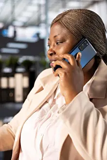 Call Prints: Businesswoman in telephone call with shareholders