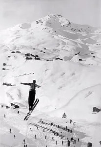 Exhilaration Prints: c. 1937. A high flyer thrills the audience as he seemingly takes flight over the valley below