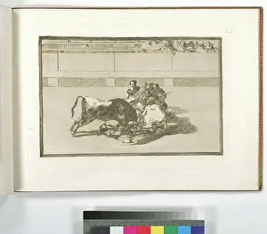 Caida de un picador de su caballo debajo del toro