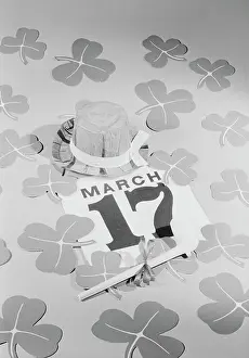 Month Prints: Calendar showing St. Patrick's Day with leprechaun hat and pipe