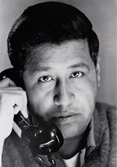 1960s Prints: California: June 10, 1967. Portrait of Cesar Chavez talking on the phone