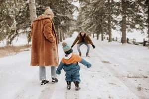 Two Parents Prints: Canada, Ontario, Parents with baby boy going on winter walk