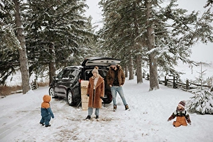 Stationary Prints: Canada, Ontario, Parents with children next to car